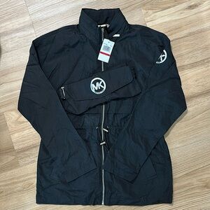 Michael Kors black XS light weight rain jacket w/ zippered hood and fanny pack.